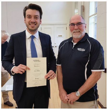 Bragg by-election report - Returning officer Bill Cinnamond with Jack Batty